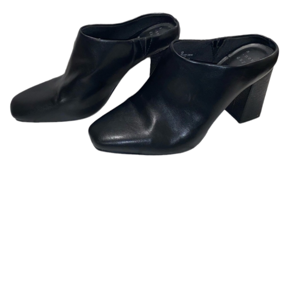 A new day black color bootie/mule with a black heel. Size 10.